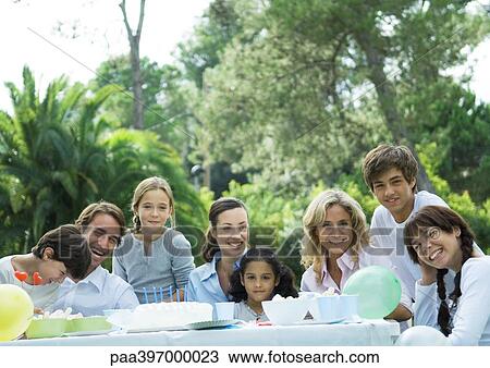 Stock Image - Outdoor birthday party. Fotosearch