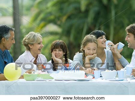 Stock Photo - Outdoor birthday party. Fotosearch