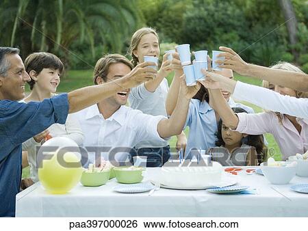 Stock Photograph - Outdoor birthday party. Fotosearch