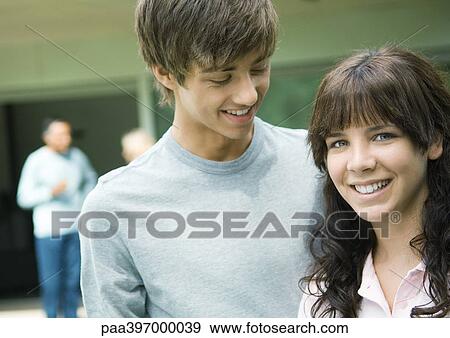 Teenage boy and girl, portrait View Large Photo Image Stock Photo - Teenage boy and girl, portrait. Fotosearch