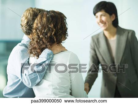 Couple facing professional woman View Large Photo Image Stock Image - Couple facing professional woman. Fotosearch