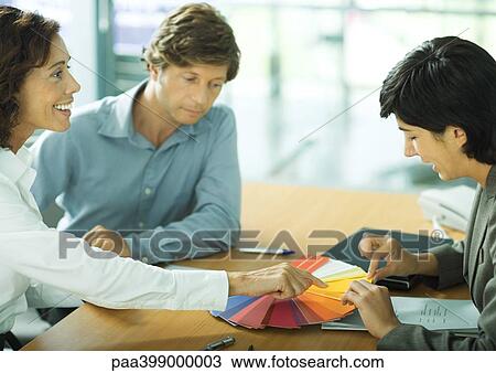 Woman pointing to color swatches View Large Photo Image Stock Image - Woman pointing to color swatches. Fotosearch