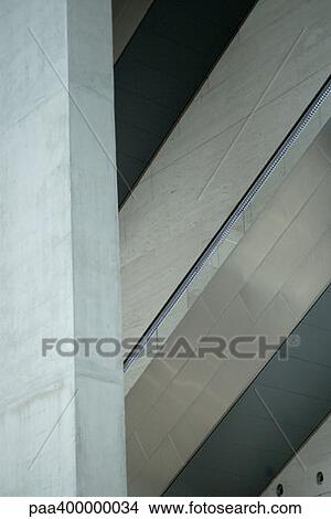 Architectural detail, concrete wall and escalator View Large Photo Image Picture - Architectural detail, concrete wall and escalator. Fotosearch