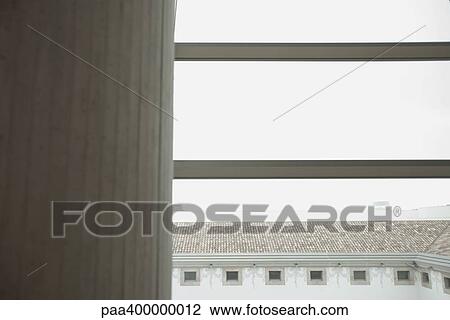 Stock Image - Architectural view of column and courtyard. Fotosearch