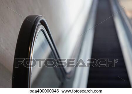 Escalator, low angle view View Large Photo Image Stock Photograph - Escalator, low angle view. Fotosearch