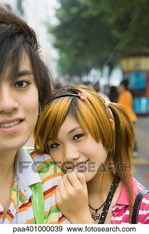 Teenage couple, portrait View Large Photo Image Stock Photo - Teenage couple, portrait. Fotosearch