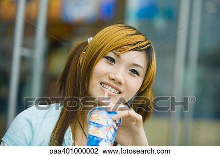 Teenage girl with drink View Large Photo Image Stock Image - Teenage girl with drink. Fotosearch