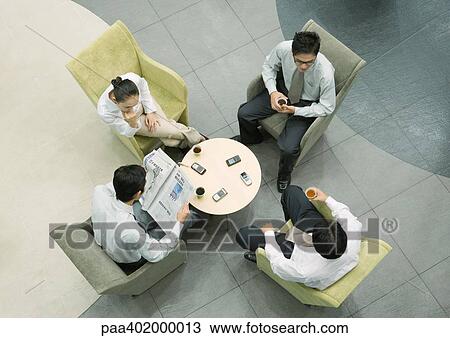 Executives sitting in lobby, view from directly above View Large Photo Image Stock Image - Executives sitting in lobby, view from directly above. Fotosearch