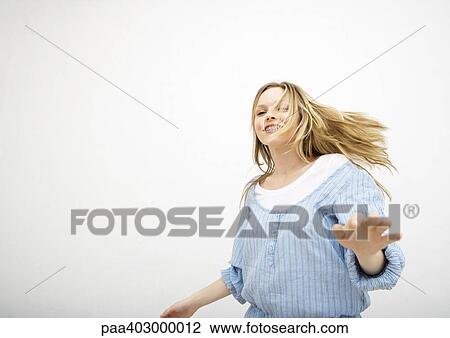 Teenage girl in movement View Large Photo Image Stock Image - Teenage girl in movement. Fotosearch