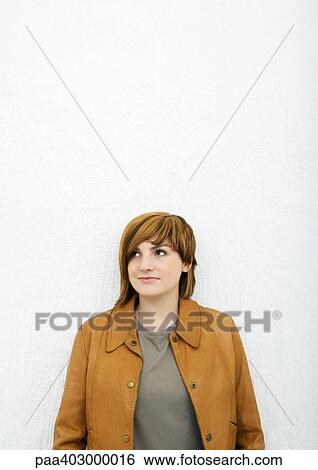 Stock Photograph - Young woman, portrait. Fotosearch
