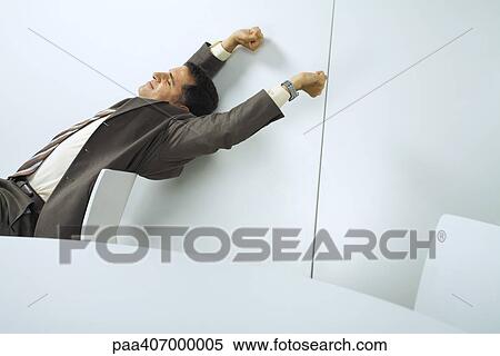 Businessman stretching, eyes closed View Large Photo Image Stock Photography - Businessman stretching, eyes closed. Fotosearch