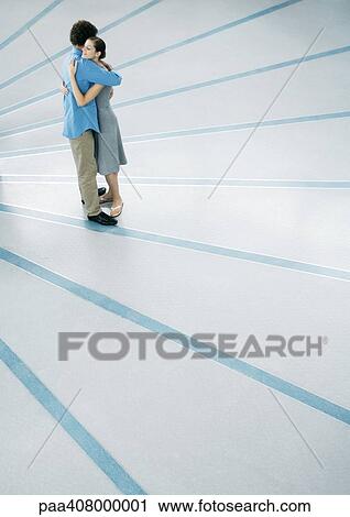 Couple hugging, full length, high angle view View Large Photo Image Stock Image - Couple hugging, full length, high angle view. Fotosearch