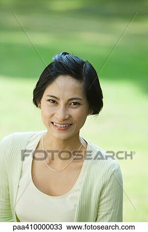Woman, smiling at camera, portrait View Large Photo Image Stock Image - Woman, smiling at camera, portrait. Fotosearch