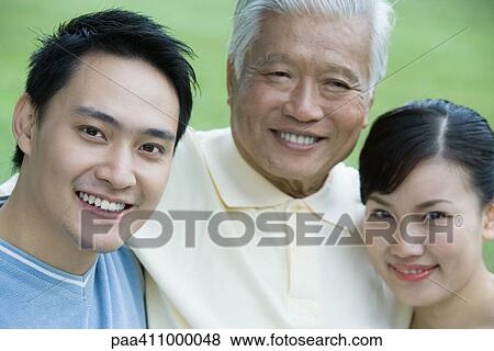 Adult couple with senior man, portrait View Large Photo Image Stock Photo - Adult couple with senior man, portrait. Fotosearch