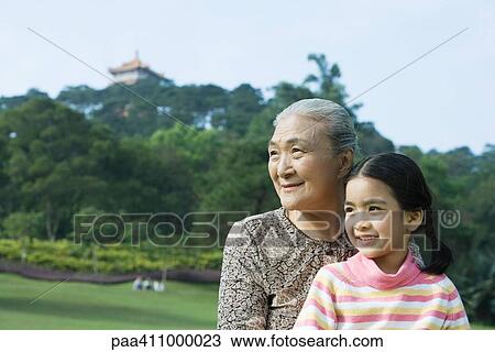 Stock Image - Girl and grandmother, portrait. Fotosearch