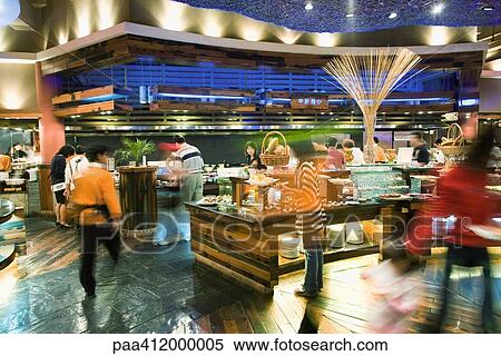 Cafeteria in shopping mall, blurred motion View Large Photo Image Stock Photography - Cafeteria in shopping mall, blurred motion. Fotosearch