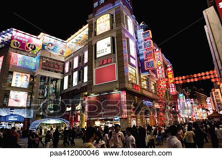 China, Guangzhou, crowded pedestrian street at night View Large Photo Image Stock Photograph - China, Guangzhou, crowded pedestrian street at night. Fotosearch