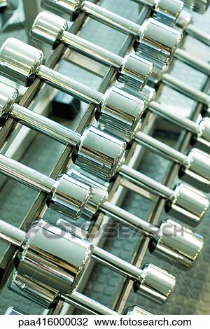 Rack of dumbbells View Large Photo Image Stock Image - Rack of dumbbells. Fotosearch