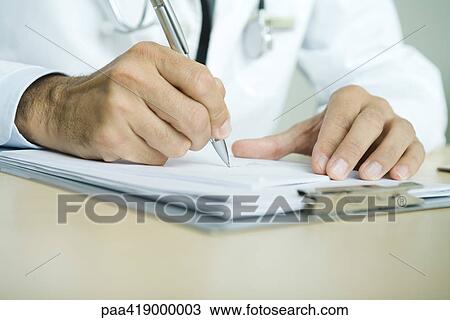 Doctor writing prescription, close-up of hands View Large Photo Image Stock Image - Doctor writing prescription, close-up of hands. Fotosearch