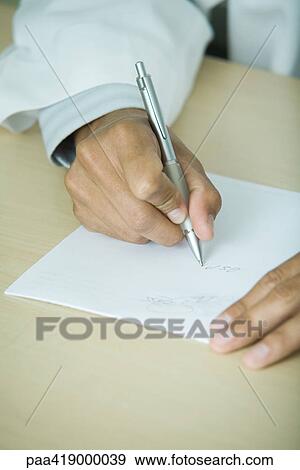 Doctor writing prescription View Large Photo Image Stock Photo - Doctor writing prescription. Fotosearch