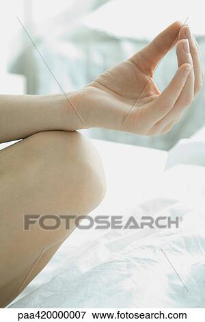 Woman's hand and knee, lotus position, close-up View Large Photo Image Stock Photo - Woman's hand and knee, lotus position, close-up. Fotosearch
