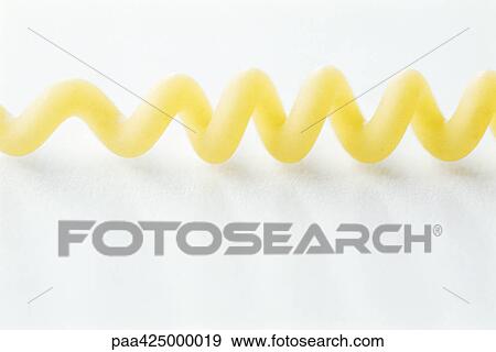 Fusilli bucati lunghi pasta View Large Photo Image Stock Photo - Fusilli bucati lunghi pasta. Fotosearch