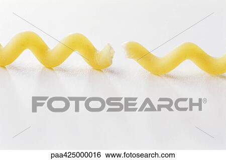 Fusilli bucati lunghi pasta View Large Photo Image Stock Photograph - Fusilli bucati lunghi pasta. Fotosearch