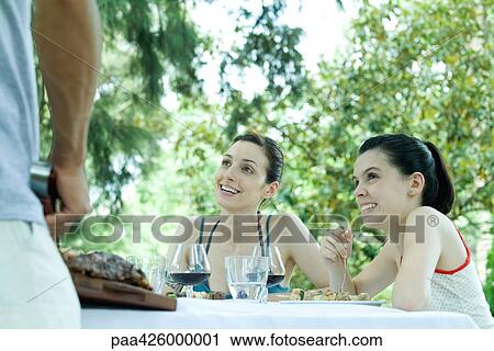 Family having cookout View Large Photo Image Stock Image - Family having cookout. Fotosearch