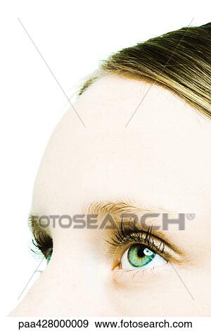 Stock Photo - Teenage girl, close-up of eyes and forehead. Fotosearch