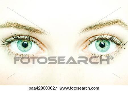 Stock Photo - Teenage girl's eyes, extreme close-up. Fotosearch
