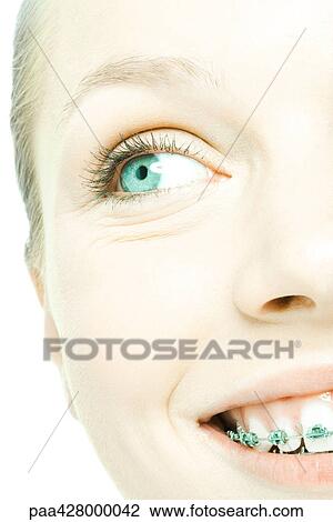 Teenage girl's face, cropped front view View Large Photo Image Stock Image - Teenage girl's face, cropped front view. Fotosearch