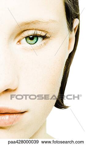 Teenage girl's face, cropped front view View Large Photo Image Stock Photo - Teenage girl's face, cropped front view. Fotosearch
