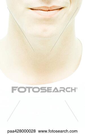 Young man, cropped view, lower face and neck, close-up View Large Photo Image Stock Photo - Young man, cropped view, lower face and neck, close-up. Fotosearch