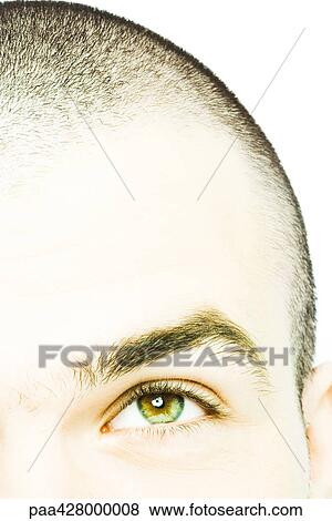 Stock Photo - Young man, cropped view of head. Fotosearch