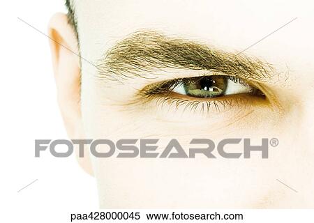 Young man's eye, extreme close-up View Large Photo Image Stock Photography - Young man's eye, extreme close-up. Fotosearch