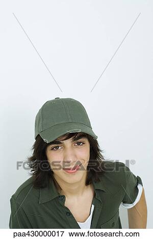 Teenage boy, smiling at camera, portrait View Large Photo Image Stock Photo - Teenage boy, smiling at camera, portrait. Fotosearch