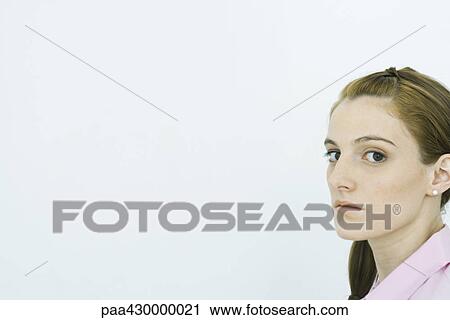 Teenage girl, looking at camera, off center View Large Photo Image Stock Image - Teenage girl, looking at camera, off center. Fotosearch