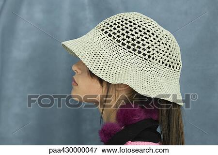 Teenage girl wearing sun hat, side view View Large Photo Image Stock Photo - Teenage girl wearing sun hat, side view. Fotosearch