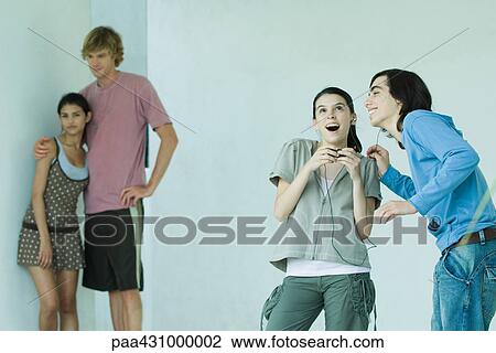Stock Image - Group of young friends. Fotosearch