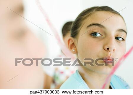 Preteen girl puckering lips View Large Photo Image Stock Image - Preteen girl puckering lips. Fotosearch