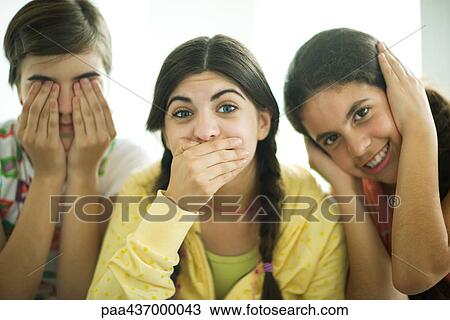 Three young female friends performing the three wise monkeys View Large Photo Image Stock Image - Three young female friends performing the three wise monkeys. Fotosearch