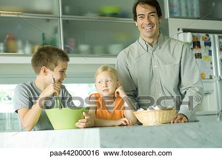 Father cooking with son and daughter View Large Photo Image Stock Photograph - Father cooking with son and daughter. Fotosearch