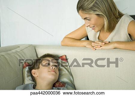 Stock Photograph - Mother and son talking. Fotosearch
