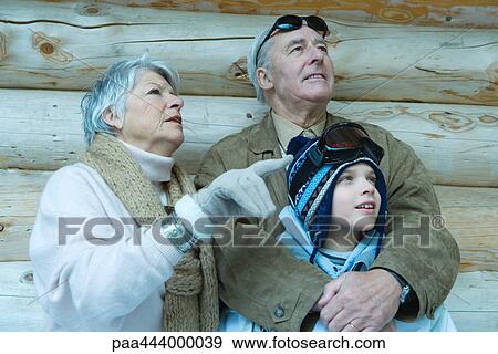 Senior couple with grandson in winter clothing, portrait View Large Photo Image Stock Photo - Senior couple with grandson in winter clothing, portrait. Fotosearch