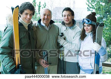 Senior man with grandchildren in ski clothing, portrait View Large Photo Image Stock Photo - Senior man with grandchildren in ski clothing, portrait. Fotosearch