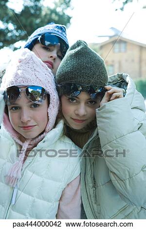 Teen girls in ski clothing, looking at camera View Large Photo Image Stock Image - Teen girls in ski clothing, looking at camera. Fotosearch