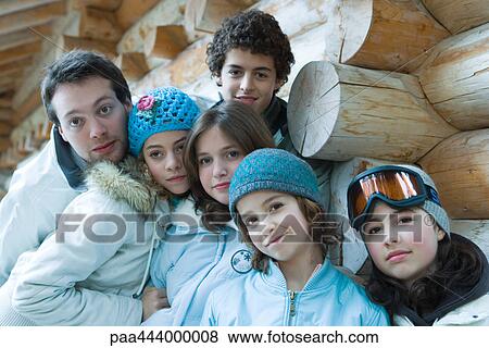 Young friends in ski clothes, portrait View Large Photo Image Stock Photo - Young friends in ski clothes, portrait. Fotosearch