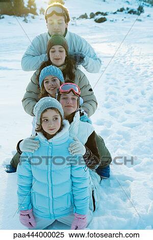 Young friends in snow, portrait View Large Photo Image Stock Photography - Young friends in snow, portrait. Fotosearch