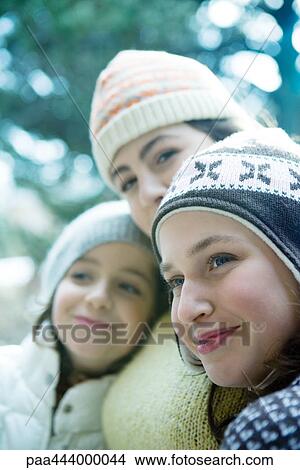 Young friends wearing winter clothing View Large Photo Image Picture - Young friends wearing winter clothing. Fotosearch