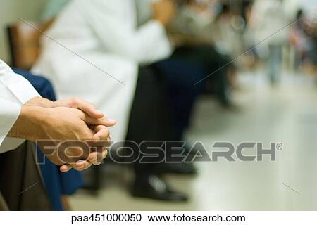 Cropped view of clasped hands, close-up View Large Photo Image Stock Image - Cropped view of clasped hands, close-up. Fotosearch